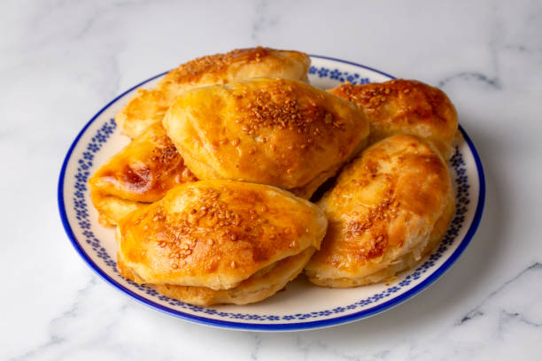 istock Turkish cuisine; Handmade Cheese Pastry (Turkish name; peynirli pogaca) 1486991445
