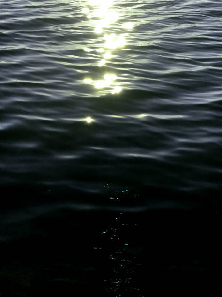 istock Reflections of light on the water. 1486991821