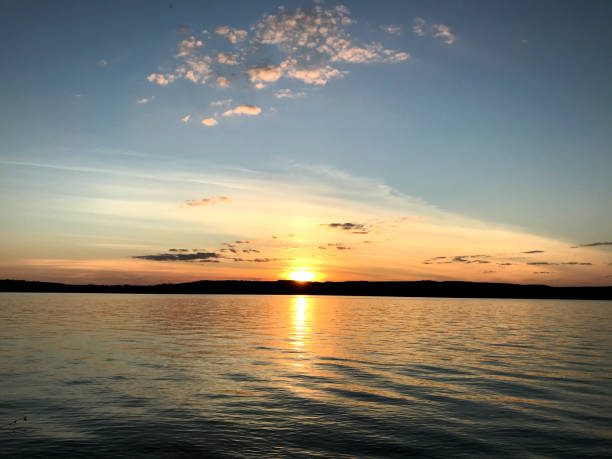 istock Sunset or sunrise over water. 1486991829