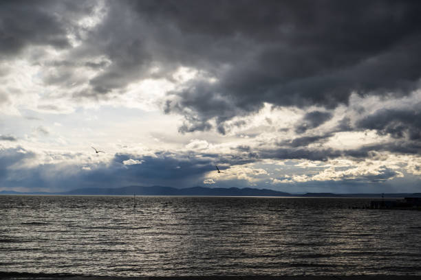 Stormy clouds over the sea at sunset