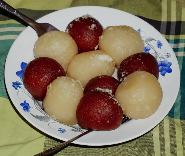 istock Gulab Jamun and Rasgulla ready to serve on a round ceramic plate 1486998244