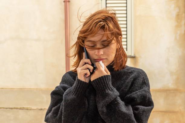 istock Young woman talking on the phone 1487001636