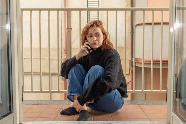 istock Young woman talking on the phone 1487001650