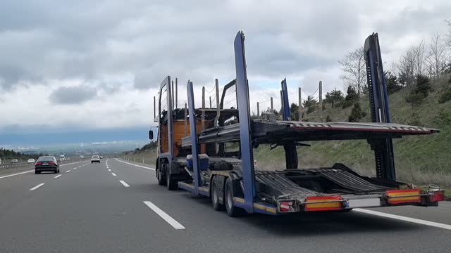 Empty Car Transporter in the Road - 4K Resolution