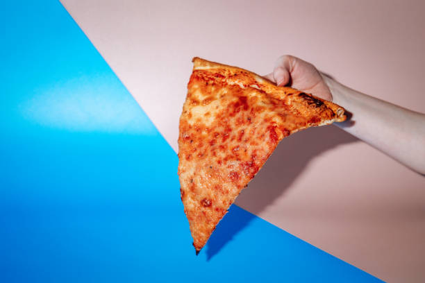 pizza slice - unhealthy eating flash stock-fotos und bilder
