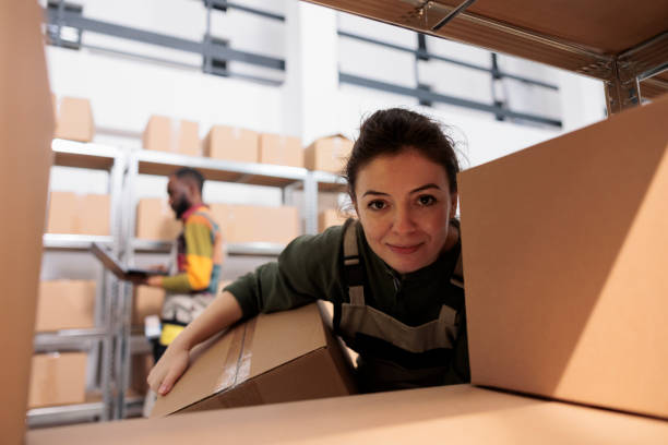 istock Selective focus of manager working with cardboard boxes 1487002375