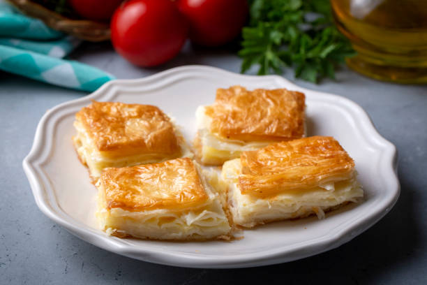 istock Delicious Turkish Tray pastry, Su boregi with cheese. Adana borek. 1487004032