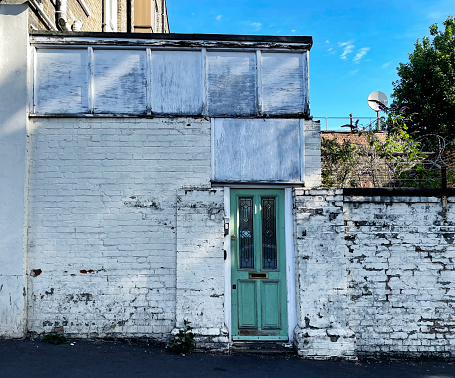 Old peeling paint on a doorway in east London