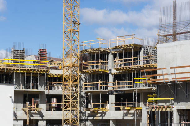 istock Construction site background. Block of flats in progress. Apartments building. 1487006205
