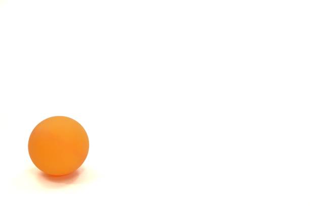 istock The image shows a beautiful bright orange ping pong ball against a white background with copy space. 1487007572