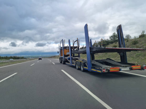 istock Empty Car Transporter in the Road 1487008280