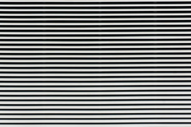 istock Metal stripes pattern. Ventilation texture. Industrial iron metal bars. Grunge grid lines. Gray metal frame background. 1487008383
