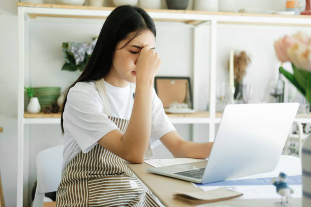 istock Stressed overwork businesswoman in the office. 1487008981