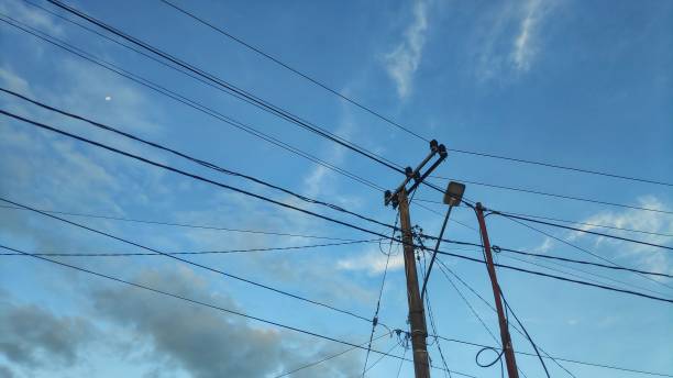 istock tangled wires in power towers 1487010155