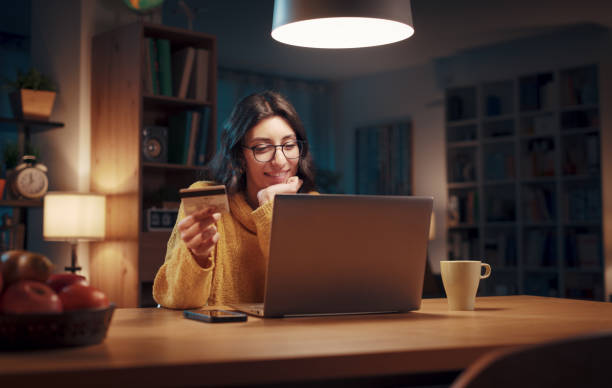 istock Woman doing online shopping at home 1487011903