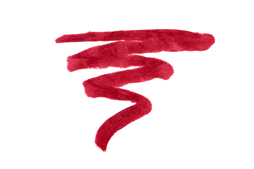 Red lip liner stroke isolated on white background. Lip pencil stroke for design.