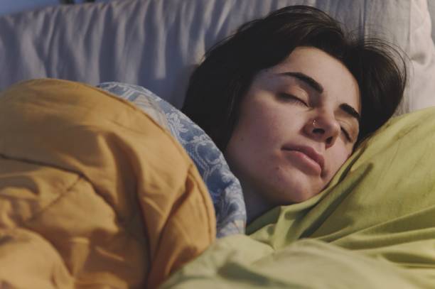 istock Woman sleep on bed 1487016330