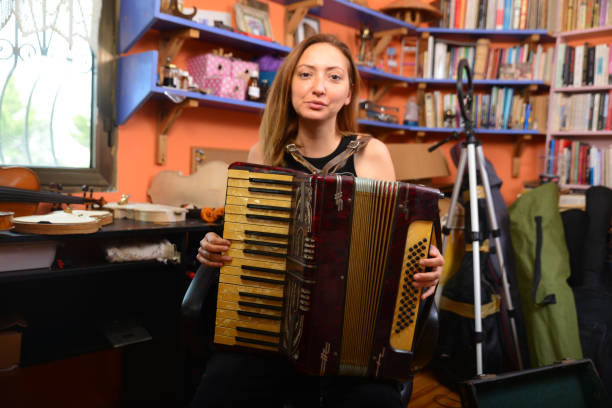 istock A woman plays the accordion 1487017031