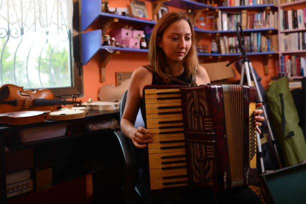 istock A woman plays the accordion 1487018962