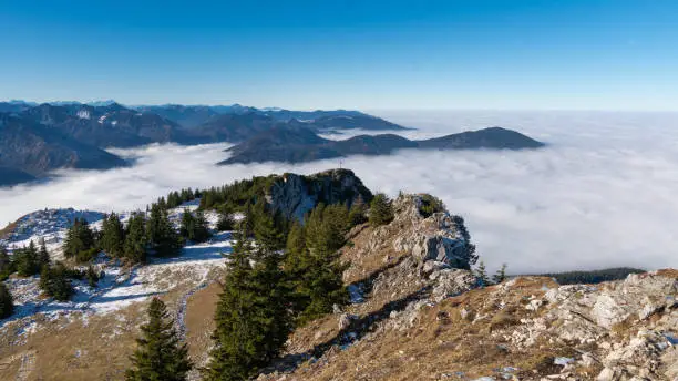 Mount Breitenstein in the Bavarian Alps above the clouds