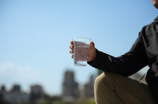 Plastic cup with multi colors background.