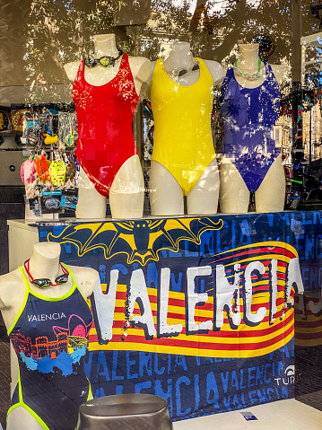 Valencia, Spain - March 12, 2023: Store window with female mannequins wearing swimsuits. As summer approaches, this type of garments increase in demand and start to be requested