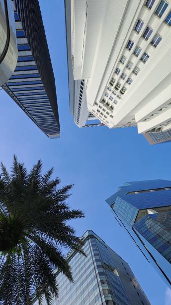 istock Blue sky behind high-rise buildings 1487021196