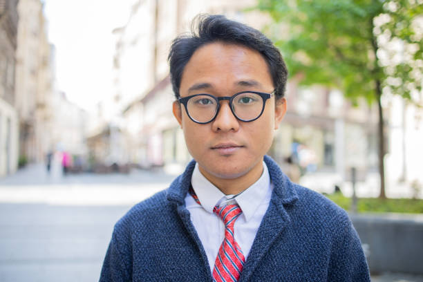 istock Beautiful young man posing outside 1487023927