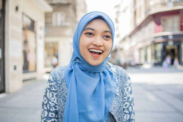 istock Beautiful young woman posing outside 1487024006