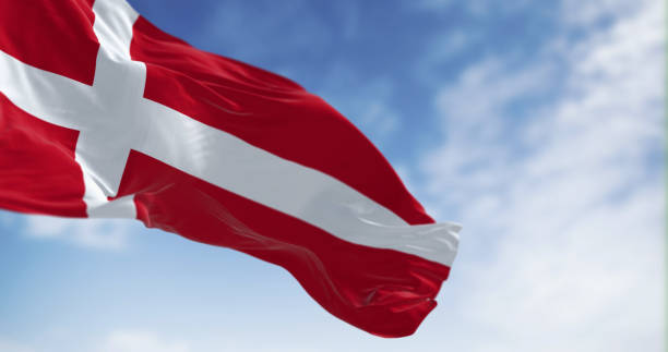 istock Denmark national flag waving in the wind on a clear day 1487030575