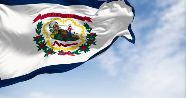 istock West Virginia state flag waving on the wind on a clear day. 1487030695