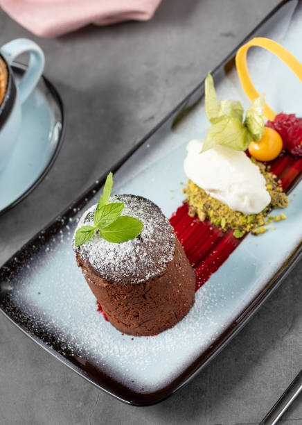istock Chocolate souffle with ice cream served in a fine dining restaurant 1487034681