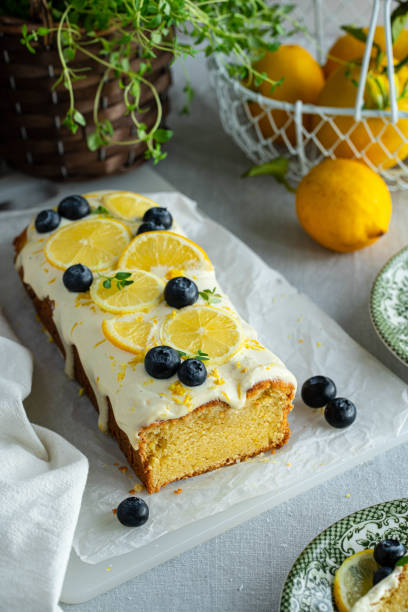 istock Lemon bundt cake with frosting,  blueberries and lemon slices. 1487034814