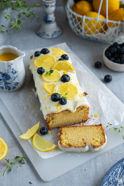 istock Lemon bundt cake with frosting,  blueberries and lemon slices. 1487034850