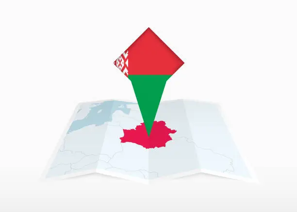 Vector illustration of Belarus is depicted on a folded paper map and pinned location marker with flag of Belarus.