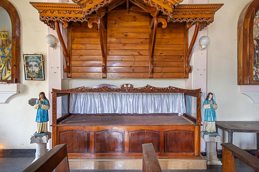 Holy Rosary Church, Negombo, Western Province, Sri Lanka - March 9th 2023:  View to a nice bench carved in wood in one of the many Sri Lankan churches in Negombo