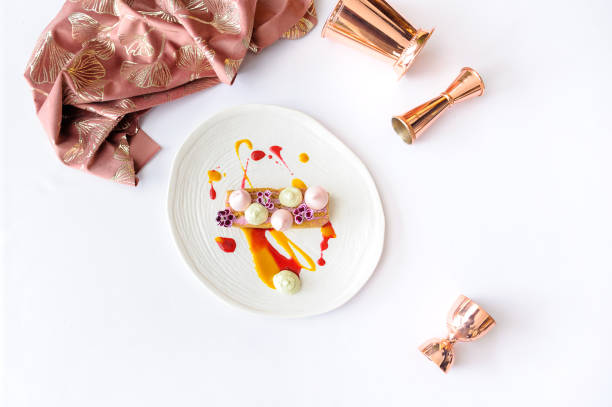 istock Carrot cake with berry mousse on a white plate isolated 1487043480
