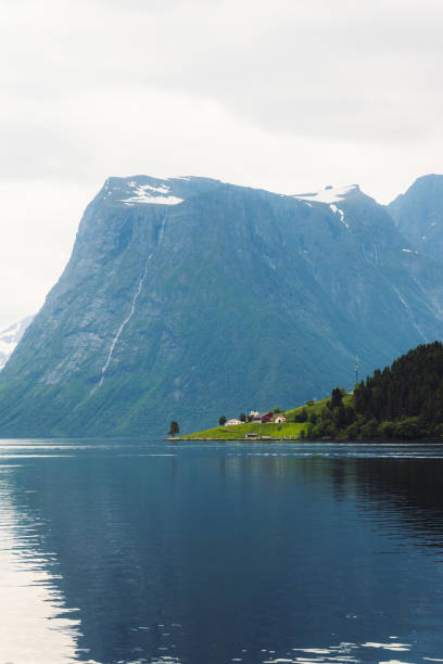 istock Summer Reflection on Scenic Fjord in Norway 1487049112