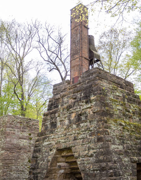 istock Stone Building with Red Brick Chimney 1487051026