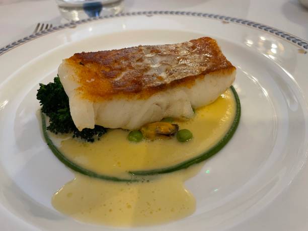 istock A white fish steak cooked in butter to a nutty, savory flavor. 1487052476