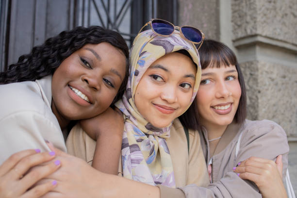 istock Happy young people spending time together outside 1487053154