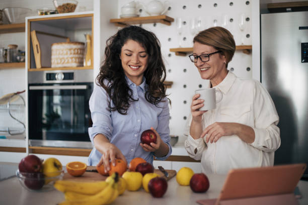 istock Mother and daughter enjoying in the kitchen. 1487056747