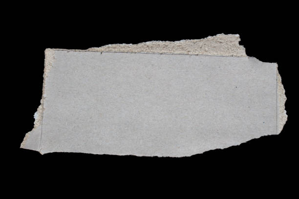 istock Ripped paper piece isolated on a black background 1487065005