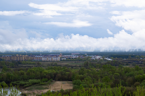 Vladimir, Russia - April 26, 2023. View from the observation deck of the residential complex and the Klyazma River