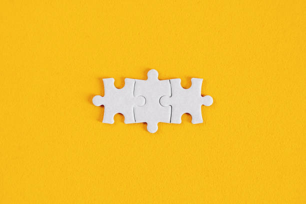 Matching Puzzle Pieces on Yellow Background