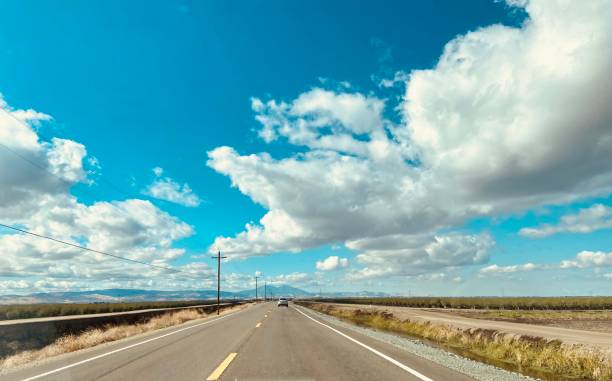 istock Highway in Central Valley California 1487067816
