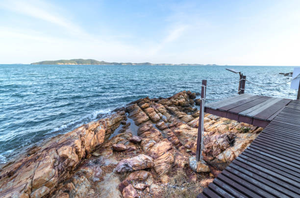 istock Wooden walkway on the seaside 1487069569