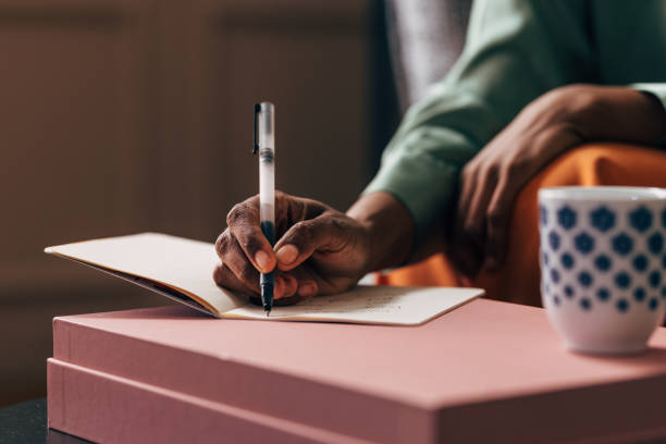 istock An Unrecognizable Woman Holding A Pen And Taking Some Notes 1487069601