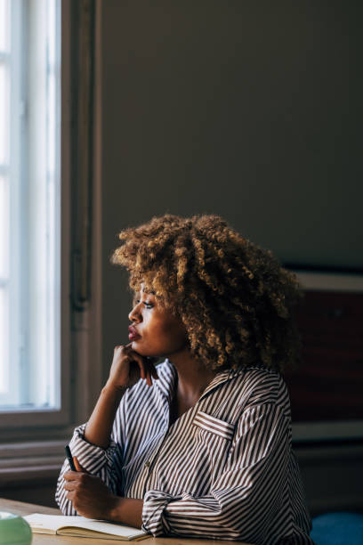 istock A Serious Beautiful Businesswoman Looking Away While Working In The Office 1487069608