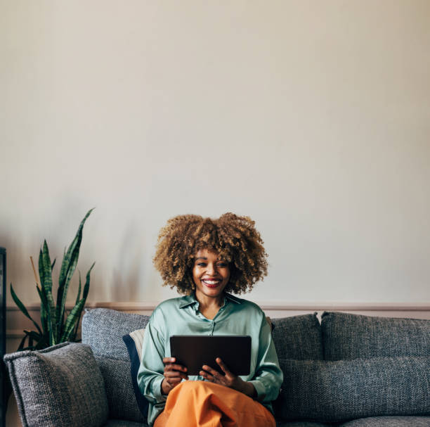 istock A Happy Beautiful Businesswoman Looking At Camera While Working 1487069630